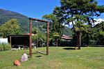 Schaukel für Kleinkinder und separater Grillplatz mit Feuerschale - Bassotta - Top-Hundeurlaub