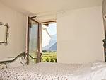 helles Schlafzimmer mit weichem Bett und Balkon - Margherita - Top-Hundeurlaub