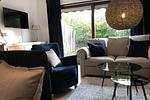 Wohnzimmer - Blue Lounge Ferienhaus - Top-Hundeurlaub
