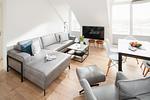 Wohnzimmer - Quartier M12 - Top-Hundeurlaub