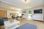 großer TV im Wohnzimmer - Wohnung 15 - Top-Hundeurlaub