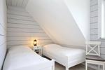 2. Schlafzimmer mit Einzelbetten im Obergeschoss - Ferienwohnung Luv - Top-Hundeurlaub