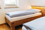 Schlafzimmer 1 Haus im Glück rechts - Haus im Glück rechts - Top-Hundeurlaub