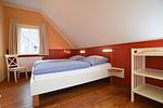 Schlafzimmer 1 DG Haus an der Weide links - Haus an der Weide links - Top-Hundeurlaub