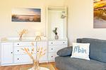 Sitzecke mit Kleiderschrank - Wohnung 026EG - Top-Hundeurlaub
