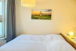 Schlafzimmer mit Doppelbett - Wohnung 026EG - Top-Hundeurlaub