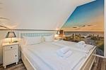 Schlafzimmer - Ferienwohnung Inselzeit auf 2 Etagen mit Strandkorb und Balkon - Top-Hundeurlaub