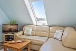 Wohnzimmer - Ferienwohnung Inselzeit auf 2 Etagen mit Strandkorb und Balkon - Top-Hundeurlaub