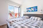Schlafzimmer - Penthaus Laboe - Top-Hundeurlaub