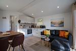 Wohnzimmer - Haus "Morgensonne", überdachte Veranda (109) - Top-Hundeurlaub