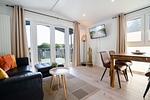 Wohnzimmer - Haus "Morgensonne", überdachte Veranda (109) - Top-Hundeurlaub