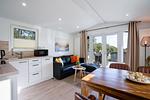 Wohnzimmer - Haus "Morgensonne", überdachte Veranda (109) - Top-Hundeurlaub