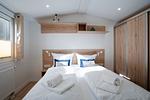 Schlafzimmer - Haus "Morgensonne", überdachte Veranda (109) - Top-Hundeurlaub