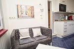 Wohnzimmer - Chalet: strandnah, Terrasse - Top-Hundeurlaub