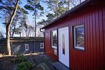 Fassade / Eingang - Chalet: strandnah, Terrasse - Top-Hundeurlaub