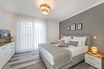Schlafzimmer - Ferienwohnung Haffkoje Fitness, Sauna und Kinderspielbereich - Top-Hundeurlaub