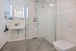 Badezimmer - Ferienwohnung Haffkoje Fitness, Sauna und Kinderspielbereich - Top-Hundeurlaub