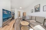 Wohnzimmer - Ferienwohnung Haffkoje Fitness, Sauna und Kinderspielbereich - Top-Hundeurlaub