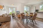 Wohnzimmer - Ferienwohnung Haffkoje Fitness, Sauna und Kinderspielbereich - Top-Hundeurlaub
