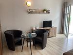 Wohnzimmer - 4 Rosenbogen - Ferienwohnung mit Wintergarten und Terrasse - Top-Hundeurlaub