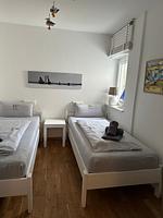 Schlafzimmer - WangerRose - Familienwohnung für Groß und Klein und Hundefreunde - Top-Hundeurlaub