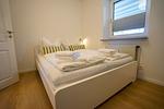 Schlafzimmer - Moderne Wohnung Albatros mit Terrasse und eigenem Garten! - Top-Hundeurlaub