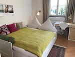 Schlafzimmer 2 mit Ausziehbett - Ferienwohnung Villa Hoyerberg See - Top-Hundeurlaub