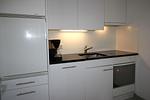 Küche / Küchenzeile - Residenza Lagrev - 1 ½ Zimmerwohnung Nr. 007 - Typ 15A - Hochparterre - Süd - Top-Hundeurlaub