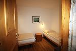 Schlafzimmer - Residenza Lagrev - 1 ½ Zimmerwohnung Nr. 001 - Typ 15A - Hochparterre - Nord/West - Top-Hundeurlaub