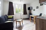 Wohnzimmer - Haus Bielefeld Appartement 9 - Top-Hundeurlaub
