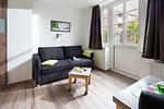 Wohnzimmer - Haus Bielefeld Appartement 9 - Top-Hundeurlaub