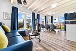 Wohnzimmer - Ferienhaus Nordseeresort 54 Südwester Büsum - Top-Hundeurlaub