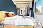 Schlafzimmer - Ferienhaus Nordseeresort 54 Südwester Büsum - Top-Hundeurlaub