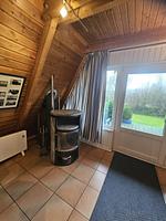 Kamin-/Ofen - Ferienhaus Nordwind Damp - Top-Hundeurlaub