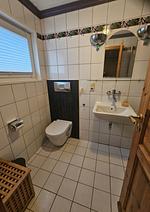 Badezimmer - Ferienhaus Nordwind Damp - Top-Hundeurlaub