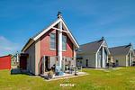 Fassade / Eingang - Ferienhaus Nordseeresort 77 Haus am See Büsum - Top-Hundeurlaub