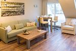 Wohnzimmer - Ferienwohnung FÖRDEBEACH Solitüde - Top-Hundeurlaub