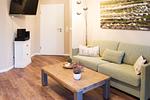 Wohnzimmer - Ferienwohnung FÖRDEBEACH Solitüde - Top-Hundeurlaub