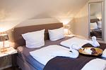 Schlafzimmer - Ferienwohnung FÖRDEBEACH Solitüde - Top-Hundeurlaub