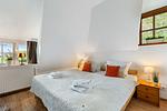 Schlafzimmer - Ferienwohnung Dornröschen I Steinbergkirche - Top-Hundeurlaub