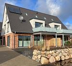 Fassade / Eingang - Ferienwohnung Küste 1 Büsum - Top-Hundeurlaub