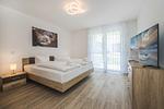 Schlafzimmer - Ferienwohnung Otterhöhle mit Fitness-, Sauna und Kinderspielbereich. - Top-Hundeurlaub