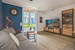 Wohnzimmer - Ferienwohnung Otterhöhle mit Fitness-, Sauna und Kinderspielbereich. - Top-Hundeurlaub