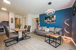 Wohnzimmer - Ferienwohnung Otterhöhle mit Fitness-, Sauna und Kinderspielbereich. - Top-Hundeurlaub