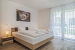 Schlafzimmer - Ferienwohnung Otterhöhle mit Fitness-, Sauna und Kinderspielbereich. - Top-Hundeurlaub
