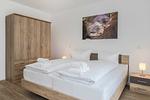 Schlafzimmer - Ferienwohnung Otterhöhle mit Fitness-, Sauna und Kinderspielbereich. - Top-Hundeurlaub