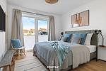 Bett - Ferienwohnung Nordseeresort 33a Diek No.1 Büsum - Top-Hundeurlaub