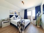 Schlafzimmer - Ferienwohnung Nordseeresort 39b Meerfreude Büsum - Top-Hundeurlaub