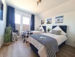 Schlafzimmer - Ferienwohnung Nordseeresort 39b Meerfreude Büsum - Top-Hundeurlaub