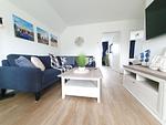 Wohnzimmer - Ferienwohnung Nordseeresort 39b Meerfreude Büsum - Top-Hundeurlaub